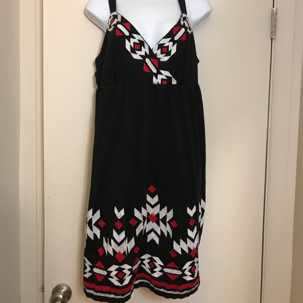 Adorable dress! Fits like 16/18
